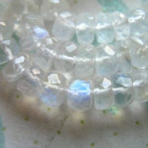 Shop Moonstone Faceted Beads! MOONSTONE RONDELLES Beads, Luxe AAA, 1/2 Strand, 4-4.5 mm, faceted, tons  blue flashes .. june birthstone ..brides bridal true 45 | Natural genuine faceted Moonstone beads for beading and jewelry making.  #jewelry #beads #beadedjewelry #diyjewelry #jewelrymaking #beadstore #beading #affiliate #ad
