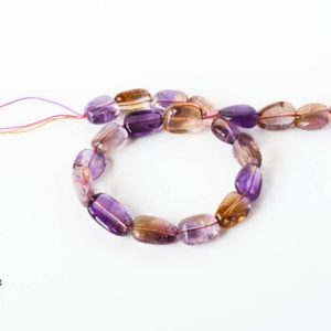 Shop Ametrine Bead Shapes! Ametrine Plaine Fine Tumble appx 15mm Best Quality,  Natural ,earth mined, 16 inch, Creative.Purple ,Blossom Colors.Exceptional,Full Luster. | Natural genuine other-shape Ametrine beads for beading and jewelry making.  #jewelry #beads #beadedjewelry #diyjewelry #jewelrymaking #beadstore #beading #affiliate #ad