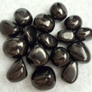 Shop Jet Stones & Crystals! Jet Tumbled Stone, Lignite | Natural genuine stones & crystals in various shapes & sizes. Buy raw cut, tumbled, or polished gemstones for making jewelry or crystal healing energy vibration raising reiki stones. #crystals #gemstones #crystalhealing #crystalsandgemstones #energyhealing #affiliate #ad