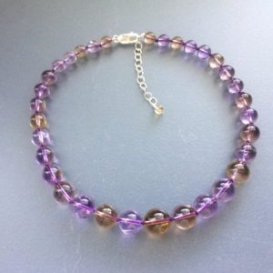 Shop Ametrine Necklaces! Knotted Sterling Silver Natural Ametrine Graduated Round Beaded Necklace, Amethyst and Citrine Necklace | Natural genuine Ametrine necklaces. Buy crystal jewelry, handmade handcrafted artisan jewelry for women.  Unique handmade gift ideas. #jewelry #beadednecklaces #beadedjewelry #gift #shopping #handmadejewelry #fashion #style #product #necklaces #affiliate #ad
