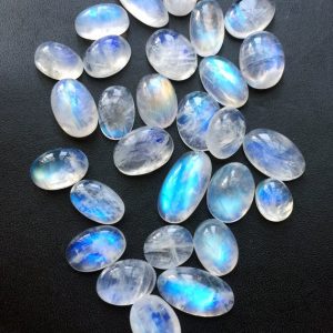 Shop Rainbow Moonstone Cabochons! 10-20mm Rainbow Moonstone Oval Plain Cabochons, Rainbow Moonstone Gemstone For Jewelry, Loose Gems Moonstone Oval (5Pcs To 10Pcs Options) | Natural genuine stones & crystals in various shapes & sizes. Buy raw cut, tumbled, or polished gemstones for making jewelry or crystal healing energy vibration raising reiki stones. #crystals #gemstones #crystalhealing #crystalsandgemstones #energyhealing #affiliate #ad