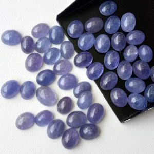 7x9mm – 8x11mm   Tanzanite Plain Cabochons, Natural Tanzanite Oval Flat Back Cabochons, Loose Tanzanite For Jewelry (5Pcs To 10Pcs Options) | Natural genuine stones & crystals in various shapes & sizes. Buy raw cut, tumbled, or polished gemstones for making jewelry or crystal healing energy vibration raising reiki stones. #crystals #gemstones #crystalhealing #crystalsandgemstones #energyhealing #affiliate #ad