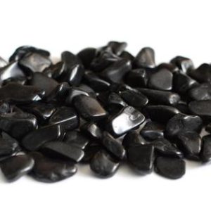 Shop Tumbled Jet Crystals & Pocket Stones! Jet: Tumbled, Small (1/4IN to 1-1/14IN) | Natural genuine stones & crystals in various shapes & sizes. Buy raw cut, tumbled, or polished gemstones for making jewelry or crystal healing energy vibration raising reiki stones. #crystals #gemstones #crystalhealing #crystalsandgemstones #energyhealing #affiliate #ad