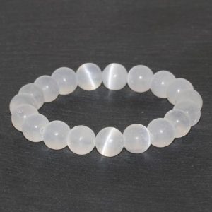 Shop Calcite Bracelets! 10mm White Selenite Beaded Bracelet, Handmade Beaded Gemstone Bracelet, White Bracelet, Stacking Bracelet Crystal Chunk, Selenite bracelet | Natural genuine Calcite bracelets. Buy crystal jewelry, handmade handcrafted artisan jewelry for women.  Unique handmade gift ideas. #jewelry #beadedbracelets #beadedjewelry #gift #shopping #handmadejewelry #fashion #style #product #bracelets #affiliate #ad