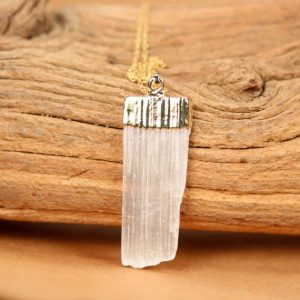 Shop Selenite Necklaces! Selenite necklace, raw crystal necklace, healing crystal pendant a gold topped selenite wand on a 14k gold filled chain | Natural genuine Selenite necklaces. Buy crystal jewelry, handmade handcrafted artisan jewelry for women.  Unique handmade gift ideas. #jewelry #beadednecklaces #beadedjewelry #gift #shopping #handmadejewelry #fashion #style #product #necklaces #affiliate #ad