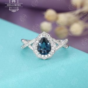 Vintage pear Topaz engagement ring white gold Pear cut London Blue Topaz halo set diamond Moissanite Wedding Twisted band Promise ring | Natural genuine Gemstone rings, simple unique alternative gemstone engagement rings. #rings #jewelry #bridal #wedding #jewelryaccessories #engagementrings #weddingideas #affiliate #ad