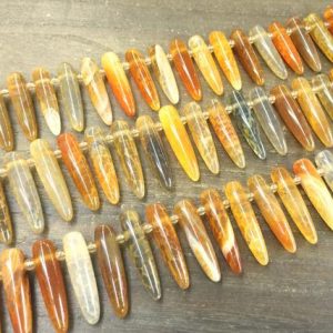 Shop Agate Bead Shapes! Yellow Agate Pendant Beads Agate Beads Spike Bullet Beads Stick Beads Top Drilled Average Size Beads supplies 7-9×33-36mm 15.5" full strand | Natural genuine other-shape Agate beads for beading and jewelry making.  #jewelry #beads #beadedjewelry #diyjewelry #jewelrymaking #beadstore #beading #affiliate #ad