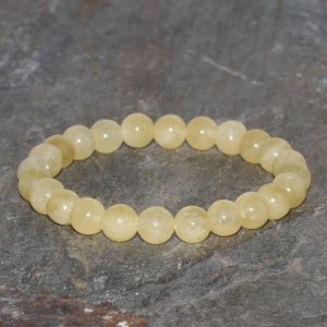 Shop Calcite Bracelets! 8mm Yellow Calcite Bracelet, Calcite Wrist Mala Beads, Yellow Calcite Jewelry, Chakra Bracelet, Yellow Bead Bracelet, Healing Calcite Mala | Natural genuine Calcite bracelets. Buy crystal jewelry, handmade handcrafted artisan jewelry for women.  Unique handmade gift ideas. #jewelry #beadedbracelets #beadedjewelry #gift #shopping #handmadejewelry #fashion #style #product #bracelets #affiliate #ad