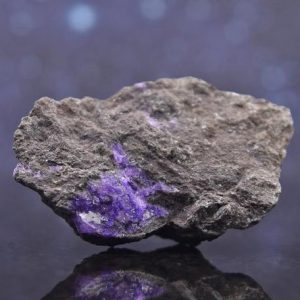 Shop Sugilite Stones & Crystals! Vibrant Purple Raw Sugilite with Manganese Matrix from South Africa | Semi Translucent | Rare | 1.67" | 18.8 grams | Natural genuine stones & crystals in various shapes & sizes. Buy raw cut, tumbled, or polished gemstones for making jewelry or crystal healing energy vibration raising reiki stones. #crystals #gemstones #crystalhealing #crystalsandgemstones #energyhealing #affiliate #ad