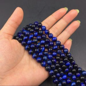 Shop Tiger Eye Round Beads! Blue Tiger Eye Beads Blue Tiger Stone Beads Round Beads Gemstone Beads Supplies 4/6/8/10/12mm Jewelry making 15.5" strand | Natural genuine round Tiger Eye beads for beading and jewelry making.  #jewelry #beads #beadedjewelry #diyjewelry #jewelrymaking #beadstore #beading #affiliate #ad