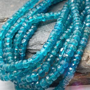 Shop Apatite Faceted Beads! Rustic Neon Blue Apatite Hand Cut Faceted Rondelle Disc Spacer Beads Teal Gemstone Beads Sea Ocean Blue Gemstone Beads 3.4mm approx | Natural genuine faceted Apatite beads for beading and jewelry making.  #jewelry #beads #beadedjewelry #diyjewelry #jewelrymaking #beadstore #beading #affiliate #ad