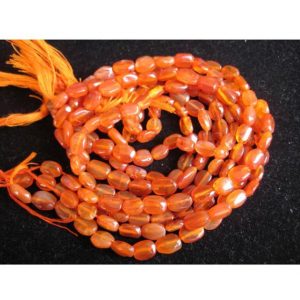 Shop Carnelian Chip & Nugget Beads! 5-7mm Carnelian Plain Oval Beads, Carnelian Oval Beads, Orange Carnelian Oval Bead, 13IN Carnelian Gemstone For Jewelry (1ST To 5ST Options) | Natural genuine chip Carnelian beads for beading and jewelry making.  #jewelry #beads #beadedjewelry #diyjewelry #jewelrymaking #beadstore #beading #affiliate #ad