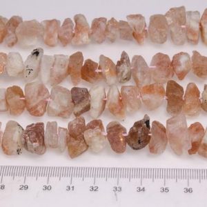 Shop Raw & Rough Sunstone Stones! Full Strand(40 cm) Large Rough lattice Sunstone Beads/Raw Lepidocrocite Nuggets/Raw Orange Strawberry Crystal Quartz-Approx.12~18mm | Natural genuine stones & crystals in various shapes & sizes. Buy raw cut, tumbled, or polished gemstones for making jewelry or crystal healing energy vibration raising reiki stones. #crystals #gemstones #crystalhealing #crystalsandgemstones #energyhealing #affiliate #ad