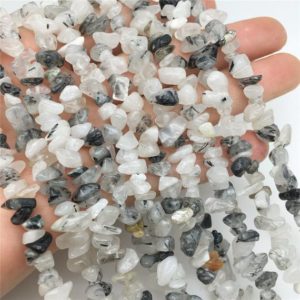 Shop Rutilated Quartz Chip & Nugget Beads! 6-8mm Black Rutilated Quartz Chip Beads, Chip Stone, Gemstone Beads | Natural genuine chip Rutilated Quartz beads for beading and jewelry making.  #jewelry #beads #beadedjewelry #diyjewelry #jewelrymaking #beadstore #beading #affiliate #ad