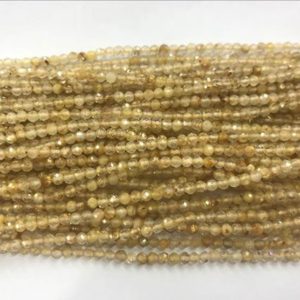 Shop Rutilated Quartz Faceted Beads! Genuine Faceted Gold Rutilated Quartz 2mm – 5mm Round Cut Natural Golden Hair Quartz Beads 15 inch Jewelry Bracelet Necklace Material Supply | Natural genuine faceted Rutilated Quartz beads for beading and jewelry making.  #jewelry #beads #beadedjewelry #diyjewelry #jewelrymaking #beadstore #beading #affiliate #ad