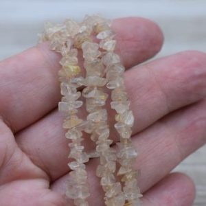 Shop Rutilated Quartz Chip & Nugget Beads! Golden Rutilated Quartz Chips / Beads – Gemstone Chips – 4-6 mm | Natural genuine chip Rutilated Quartz beads for beading and jewelry making.  #jewelry #beads #beadedjewelry #diyjewelry #jewelrymaking #beadstore #beading #affiliate #ad