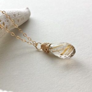 Shop Rutilated Quartz Necklaces! Golden Rutilated Quartz Necklace, Minimalist Gold Quartz, Solitaire Quartz Pendant | Natural genuine Rutilated Quartz necklaces. Buy crystal jewelry, handmade handcrafted artisan jewelry for women.  Unique handmade gift ideas. #jewelry #beadednecklaces #beadedjewelry #gift #shopping #handmadejewelry #fashion #style #product #necklaces #affiliate #ad