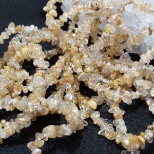 Shop Rutilated Quartz Chip & Nugget Beads! Golden Rutilated Quartz Gemstone Chip Beads 34 In. Full Strand, Polished Chip Beads, Golden Rutilated Quartz, Random Sizes, Spacers | Natural genuine chip Rutilated Quartz beads for beading and jewelry making.  #jewelry #beads #beadedjewelry #diyjewelry #jewelrymaking #beadstore #beading #affiliate #ad