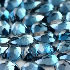Shop Topaz Cabochons! London Blue Topaz Rose Cut Pear Cabochon 6x4mm – per stone | Natural genuine stones & crystals in various shapes & sizes. Buy raw cut, tumbled, or polished gemstones for making jewelry or crystal healing energy vibration raising reiki stones. #crystals #gemstones #crystalhealing #crystalsandgemstones #energyhealing #affiliate #ad