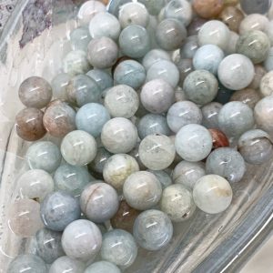 Shop Aquamarine Round Beads! Natural Blue Round Aquamarine beads / 8mm approx/ Soft Pale Blue Gemstone Beads / Tonal variance SOLD IN A BAG | Natural genuine round Aquamarine beads for beading and jewelry making.  #jewelry #beads #beadedjewelry #diyjewelry #jewelrymaking #beadstore #beading #affiliate #ad