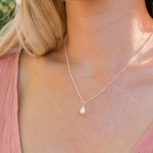 Shop Dainty Jewelry! Tiny Pearl Necklace. Little White Freshwater Pearl Necklace. White Dancing Pearl Necklace. June Birthstone Necklace. Dainty pearl necklace. | Natural genuine Gemstone jewelry. Buy crystal jewelry, handmade handcrafted artisan jewelry for women.  Unique handmade gift ideas. #jewelry #beadedjewelry #beadedjewelry #gift #shopping #handmadejewelry #fashion #style #product #jewelry #affiliate #ad
