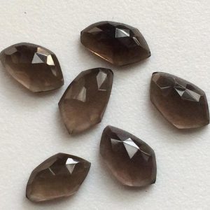 Shop Smoky Quartz Cabochons! 14-16mm Smoky Quartz Cabochons, Smoky Quartz Fancy Shape Rose Cut Flat Back Gems, Loose Smoky Quartz For Jewelry (5Pcs To 20Pcs Options) | Natural genuine stones & crystals in various shapes & sizes. Buy raw cut, tumbled, or polished gemstones for making jewelry or crystal healing energy vibration raising reiki stones. #crystals #gemstones #crystalhealing #crystalsandgemstones #energyhealing #affiliate #ad