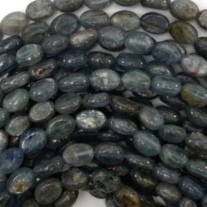 Shop Kyanite Beads! 8mm blue kyanite flat oval beads 16" strand 38732 | Natural genuine beads Kyanite beads for beading and jewelry making.  #jewelry #beads #beadedjewelry #diyjewelry #jewelrymaking #beadstore #beading #affiliate #ad