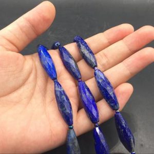Shop Lapis Lazuli Bead Shapes! Long Lapis Marquise Beads Faceted Lapis Lazuli Briolettes 30x10mm Marquise Beads Vertical Drilled Focal Beads Semi precious 11-12beads/lot | Natural genuine other-shape Lapis Lazuli beads for beading and jewelry making.  #jewelry #beads #beadedjewelry #diyjewelry #jewelrymaking #beadstore #beading #affiliate #ad