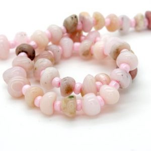 Shop Opal Chip & Nugget Beads! Pink Opal Beads, Natural Pink Opal Nuggets Rough Cut Irregular Shape Smooth Loose Gemstone Beads – Small Assorted Size -Full Strand | Natural genuine chip Opal beads for beading and jewelry making.  #jewelry #beads #beadedjewelry #diyjewelry #jewelrymaking #beadstore #beading #affiliate #ad