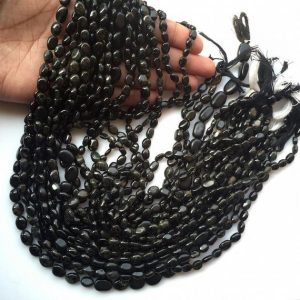 Shop Black Tourmaline Bead Shapes! Black Tourmaline Smooth Oval Beads, 6mm Wholesale Natural Tourmaline Beads, 13.5 Inch Strand, Sold As 1 Strand/5 Strand, SKU- TR7 | Natural genuine other-shape Black Tourmaline beads for beading and jewelry making.  #jewelry #beads #beadedjewelry #diyjewelry #jewelrymaking #beadstore #beading #affiliate #ad