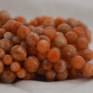 High Quality Grade A Natural Orange Calcite Semi-precious Gemstone Round Beads – 6mm, 8mm, 10mm sizes – 15" strand | Natural genuine round Orange Calcite beads for beading and jewelry making.  #jewelry #beads #beadedjewelry #diyjewelry #jewelrymaking #beadstore #beading #affiliate #ad