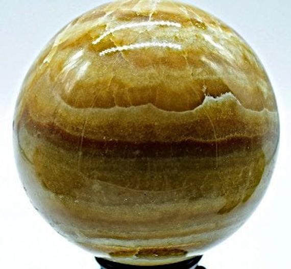 Banded Amber Calcite Sphere 5.6" In Diameter 9.38 Pounds