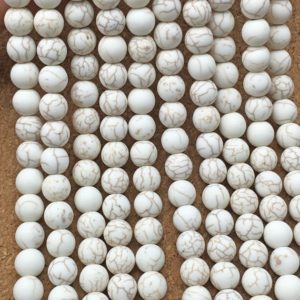 Shop Howlite Round Beads! 10mm Matte White Howlite Beads, Round Gemstone Beads, Wholesale Beads | Natural genuine round Howlite beads for beading and jewelry making.  #jewelry #beads #beadedjewelry #diyjewelry #jewelrymaking #beadstore #beading #affiliate #ad