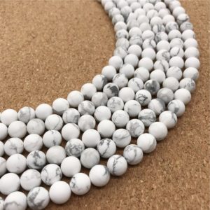 Shop Howlite Round Beads! 8mm Matte White Howlite Beads, Round Gemstone Beads, Wholesale Beads | Natural genuine round Howlite beads for beading and jewelry making.  #jewelry #beads #beadedjewelry #diyjewelry #jewelrymaking #beadstore #beading #affiliate #ad