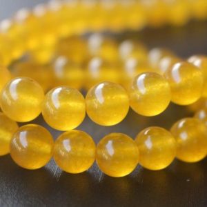 Yellow Jade Smooth Round Beads,4mm/6mm/8mm/10mm/12mm/14mm Candy Jade Beads Supply,15 inches one starand | Natural genuine round Gemstone beads for beading and jewelry making.  #jewelry #beads #beadedjewelry #diyjewelry #jewelrymaking #beadstore #beading #affiliate #ad