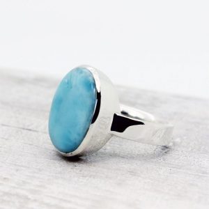 Shop Larimar Rings! Bright blue Larimar ring oval shape simple genuine Larimar cab stone set on 925 sterling silver great quality nickel free silver | Natural genuine Larimar rings, simple unique handcrafted gemstone rings. #rings #jewelry #shopping #gift #handmade #fashion #style #affiliate #ad
