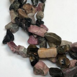 Shop Pink Tourmaline Chip & Nugget Beads! Mixed Tourmaline gemstone raw 10x14mm nugget beads on a full 15" strand. Raw semi-matte Tourmaline in black, green & pink. | Natural genuine chip Pink Tourmaline beads for beading and jewelry making.  #jewelry #beads #beadedjewelry #diyjewelry #jewelrymaking #beadstore #beading #affiliate #ad