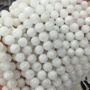 Shop Moonstone Round Beads! 10mm Natural Rainbow Moonstone Beads, Round Gemstone Beads, Wholesale Beads | Natural genuine round Moonstone beads for beading and jewelry making.  #jewelry #beads #beadedjewelry #diyjewelry #jewelrymaking #beadstore #beading #affiliate #ad