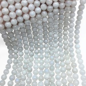 Shop Moonstone Round Beads! 8mm Natural Rainbow Moonstone Beads, Round Gemstone Beads, Wholesale Beads | Natural genuine round Moonstone beads for beading and jewelry making.  #jewelry #beads #beadedjewelry #diyjewelry #jewelrymaking #beadstore #beading #affiliate #ad