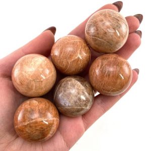 Peach moonstone Sphere, crystal ball, moonstone sphere, peach moonstone, crystal sphere | Natural genuine stones & crystals in various shapes & sizes. Buy raw cut, tumbled, or polished gemstones for making jewelry or crystal healing energy vibration raising reiki stones. #crystals #gemstones #crystalhealing #crystalsandgemstones #energyhealing #affiliate #ad