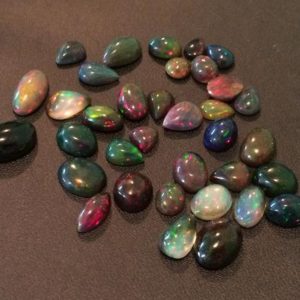 7-9mm Black Opal Plain Flat Back Cabochons, Ethiopian Welo Black Opal Flat Back Beads, Enhanced Fire Black Opal For Jewelry 10 Pieces | Natural genuine other-shape Opal beads for beading and jewelry making.  #jewelry #beads #beadedjewelry #diyjewelry #jewelrymaking #beadstore #beading #affiliate #ad
