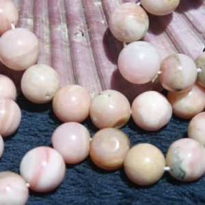Shop Opal Round Beads! Pink Peruvian Opal Smooth Round Bead 14 In. Strand, 9mm to 11mm, Peruvian Pink Opal Bead, Genuine Opal, Natural Semi Precious Gemstone, | Natural genuine round Opal beads for beading and jewelry making.  #jewelry #beads #beadedjewelry #diyjewelry #jewelrymaking #beadstore #beading #affiliate #ad