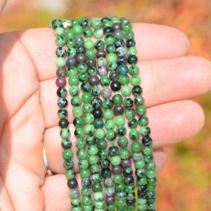 Shop Ruby Zoisite Round Beads! 1 Strand Ruby in Zoisite 4mm Round Beads  BD966 | Natural genuine round Ruby Zoisite beads for beading and jewelry making.  #jewelry #beads #beadedjewelry #diyjewelry #jewelrymaking #beadstore #beading #affiliate #ad