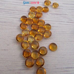 Shop Citrine Cabochons! 3MM Citrine Cabochons / Loose Round Calibrated Yellow Citrine / November Birthstone / Gemstone Cabochon / Jewelry Making Supplies 10 pcs | Natural genuine stones & crystals in various shapes & sizes. Buy raw cut, tumbled, or polished gemstones for making jewelry or crystal healing energy vibration raising reiki stones. #crystals #gemstones #crystalhealing #crystalsandgemstones #energyhealing #affiliate #ad