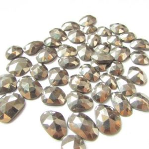 Shop Pyrite Stones & Crystals! 7x11mm – 12x16mm Golden Pyrite Rose Cut Flat Cabochons Gemstone, Pyrite Cabochon Uneven Rosecut Flat Loose Gemstone (25 Carat 3-4 Pcs Lots) | Natural genuine stones & crystals in various shapes & sizes. Buy raw cut, tumbled, or polished gemstones for making jewelry or crystal healing energy vibration raising reiki stones. #crystals #gemstones #crystalhealing #crystalsandgemstones #energyhealing #affiliate #ad