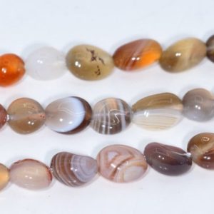 Shop Agate Chip & Nugget Beads! 4-9MM Botswana Agate Beads Pebble Nugget Grade AAA Genuine Natural Gemstone Beads 15.5"/7.5" Bulk Lot Options (108423) | Natural genuine chip Agate beads for beading and jewelry making.  #jewelry #beads #beadedjewelry #diyjewelry #jewelrymaking #beadstore #beading #affiliate #ad