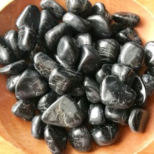 Shop Tumbled Black Tourmaline Crystals & Pocket Stones! Black Tourmaline Tumbled Stone | Gemstone Crystal | Natural genuine stones & crystals in various shapes & sizes. Buy raw cut, tumbled, or polished gemstones for making jewelry or crystal healing energy vibration raising reiki stones. #crystals #gemstones #crystalhealing #crystalsandgemstones #energyhealing #affiliate #ad