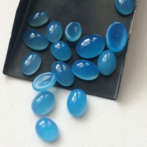 Shop Blue Chalcedony Stones & Crystals! 9x11mm – 12x16mm Blue Chalcedony Plain Oval Cabochon, Blue Chalcedony Oval  Flat Back Stone Cabochons For Jewelry (3Pcs To 9Pcs Options) | Natural genuine stones & crystals in various shapes & sizes. Buy raw cut, tumbled, or polished gemstones for making jewelry or crystal healing energy vibration raising reiki stones. #crystals #gemstones #crystalhealing #crystalsandgemstones #energyhealing #affiliate #ad
