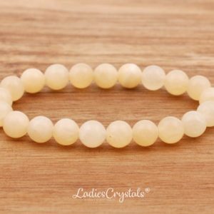 Shop Calcite Bracelets! Yellow Calcite Bracelets 8 mm, Genuine Calcite, Honey Calcite, Stones, Gems, Gifts, Crystals, Zodiac Crystals, Metaphysical Crystals, Favors | Natural genuine Calcite bracelets. Buy crystal jewelry, handmade handcrafted artisan jewelry for women.  Unique handmade gift ideas. #jewelry #beadedbracelets #beadedjewelry #gift #shopping #handmadejewelry #fashion #style #product #bracelets #affiliate #ad