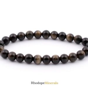 Shop Golden Obsidian Bracelets! Gold Obsidian Bracelet, Golden Obsidian Bracelet 6 mm Beads, Obsidian, Bracelets, Metaphysical Crystals, Gifts, Crystals, Gemstones, Gems | Natural genuine Golden Obsidian bracelets. Buy crystal jewelry, handmade handcrafted artisan jewelry for women.  Unique handmade gift ideas. #jewelry #beadedbracelets #beadedjewelry #gift #shopping #handmadejewelry #fashion #style #product #bracelets #affiliate #ad
